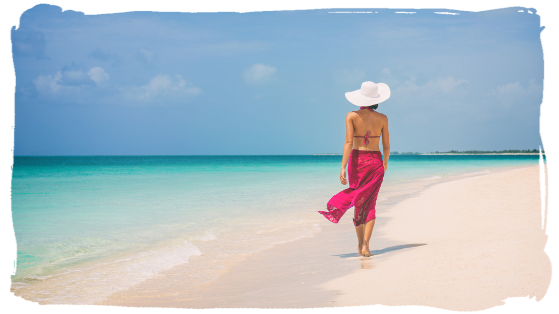 Woman walking on beach