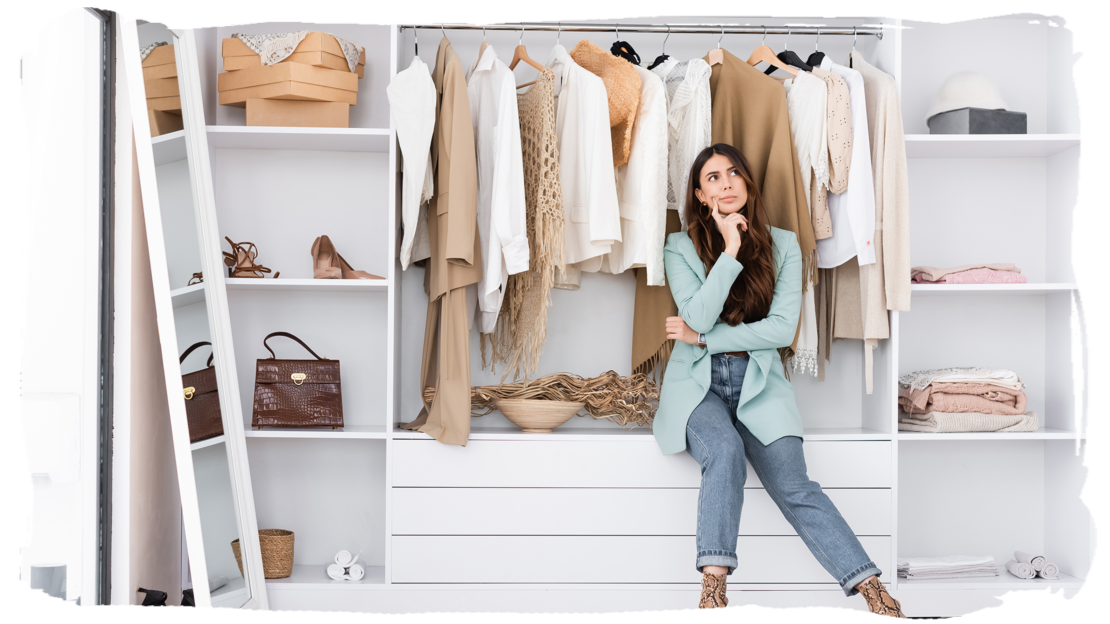 Woman sitting in wardrobe